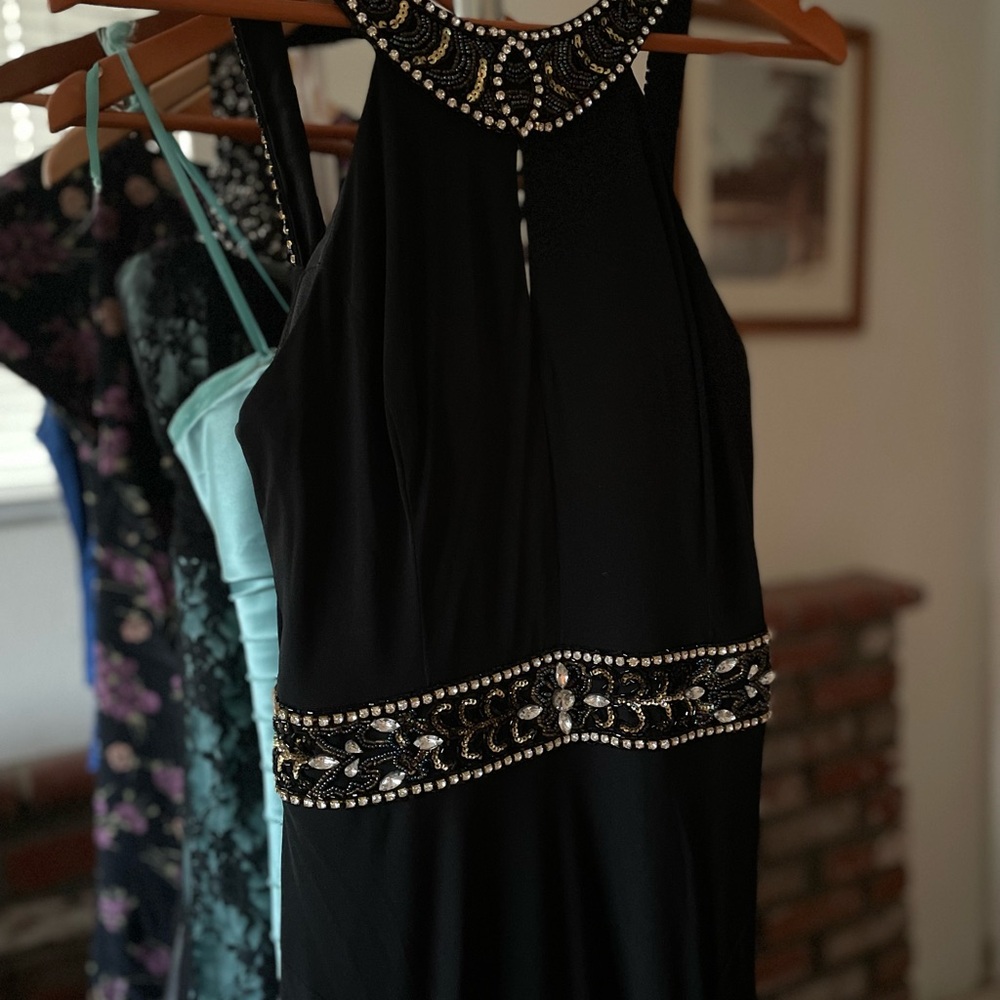 Dark Goddess floor-length evening dress with adjustable train